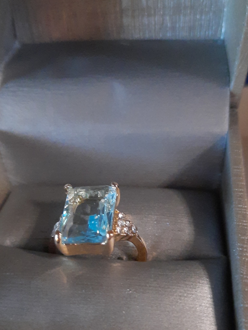 Fashsion Gold Ring with Light Blue Emerald-Cut Gemstone and Side Diamonds Size 7